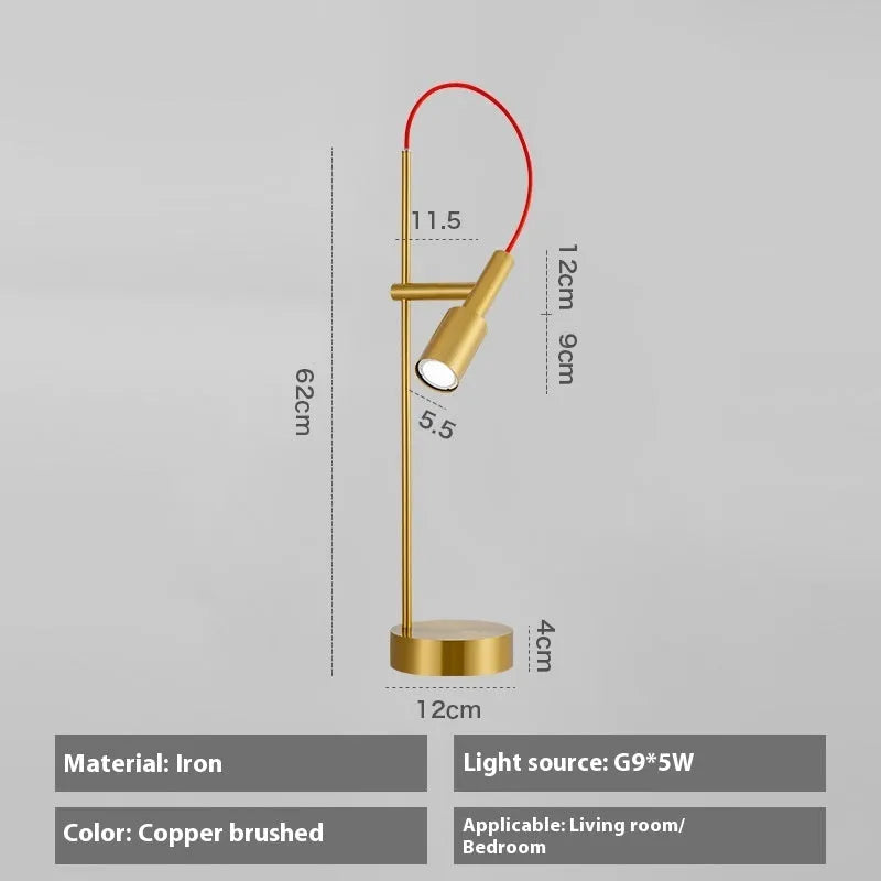 Rotating wrought iron bedside table lamp with G9 5W light source, available in sand black, sand nickel, or natural copper.