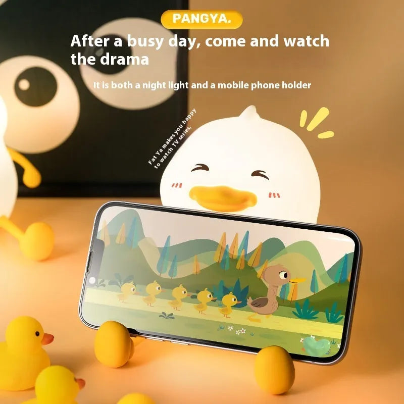 Chubby silicone pat night light with phone holder function on desk