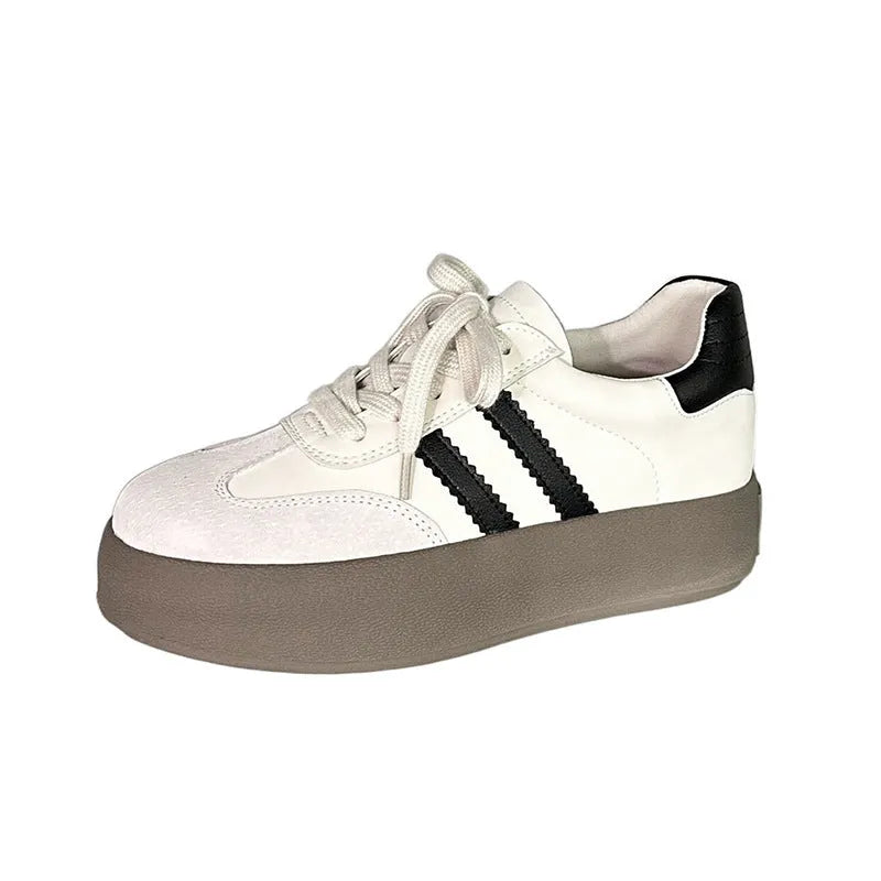 Women's vintage distressed leather sneakers with round toe and lace-up design in beige and black colour options