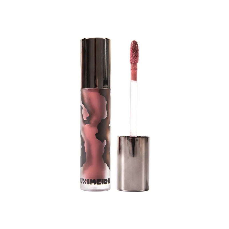 Matte lip mud lipstick in tube showing five colour shades: orange brown coffee, cool grey, cinnamon coffee, jujube red, smoked purple.