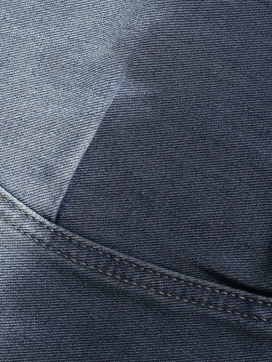 Blue tie-dye gradient cropped jeans with a washed-out finish and loose fit.