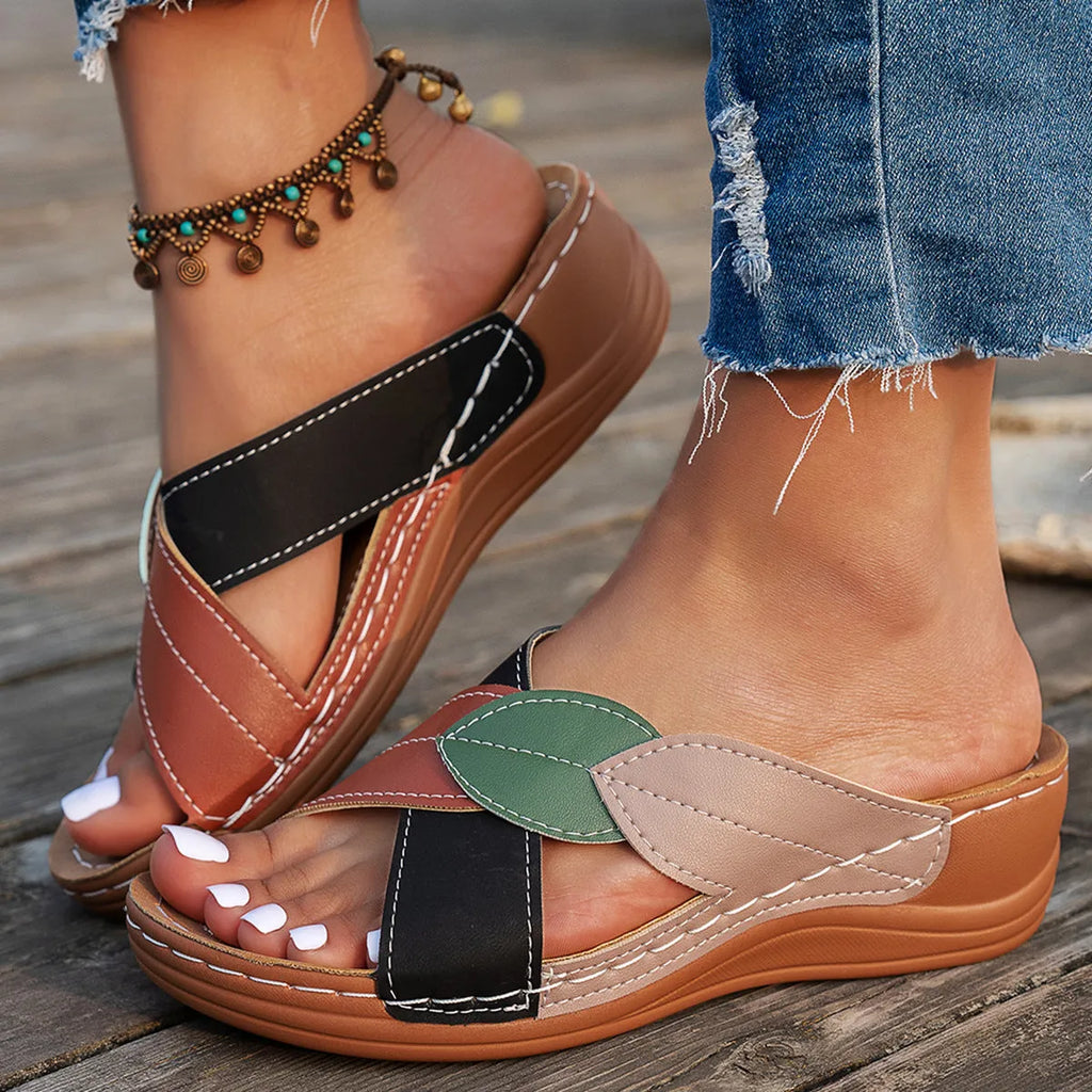 Women's black thick-soled peep-toe slippers with cross-strap design in artificial PU leather
