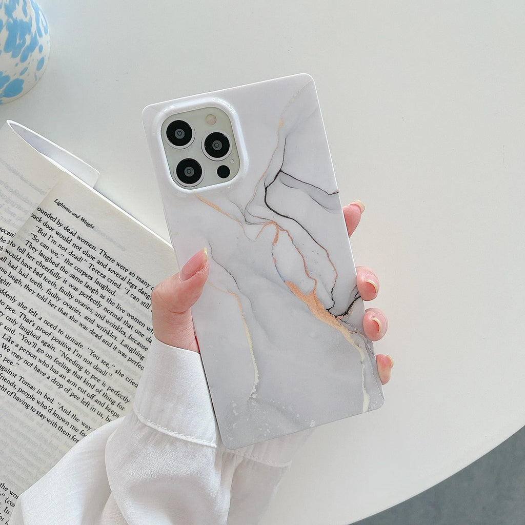 Square gilt marble iPhone case in TPU and silicone with straight edge and IMD print, shown in marble colourways