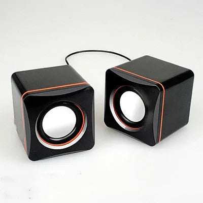 Small black square 2.0 USB computer speaker for Model 700B PC on a desk