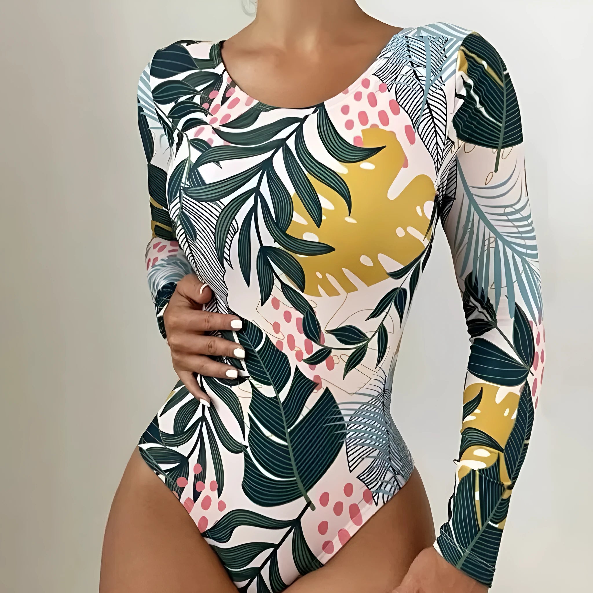 Women's floral print one-piece swimsuit with a split backless design in a selection of colours.