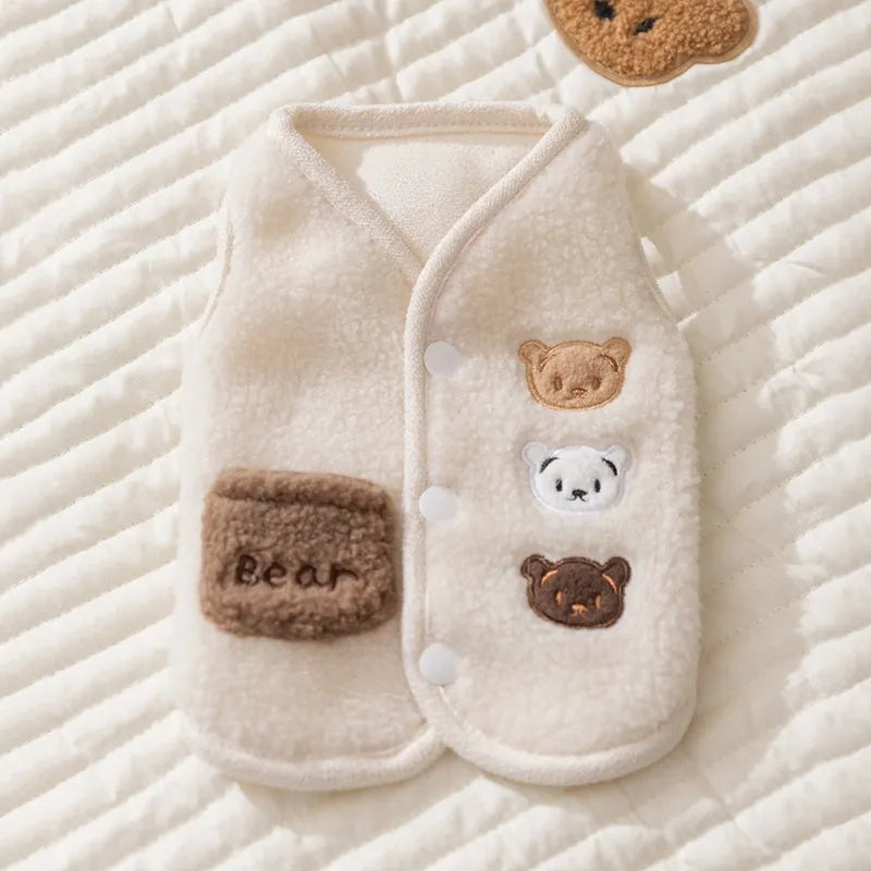 Warm fleece dog jacket with bear embroidery for small breeds, side-button closure, available in brown and white.