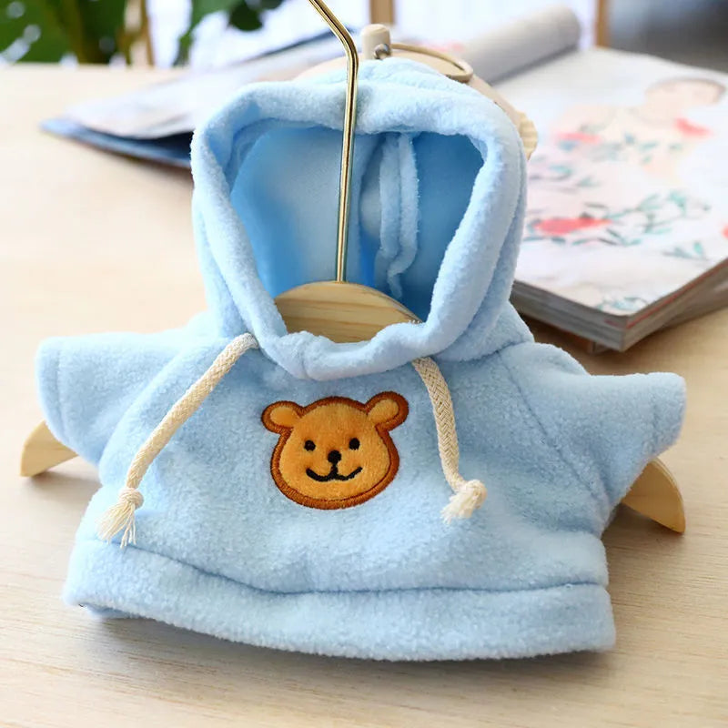 Hooded dog sweater on a mannequin in one of six colours: blue, pink, red, yellow, brown, or grey bear print.