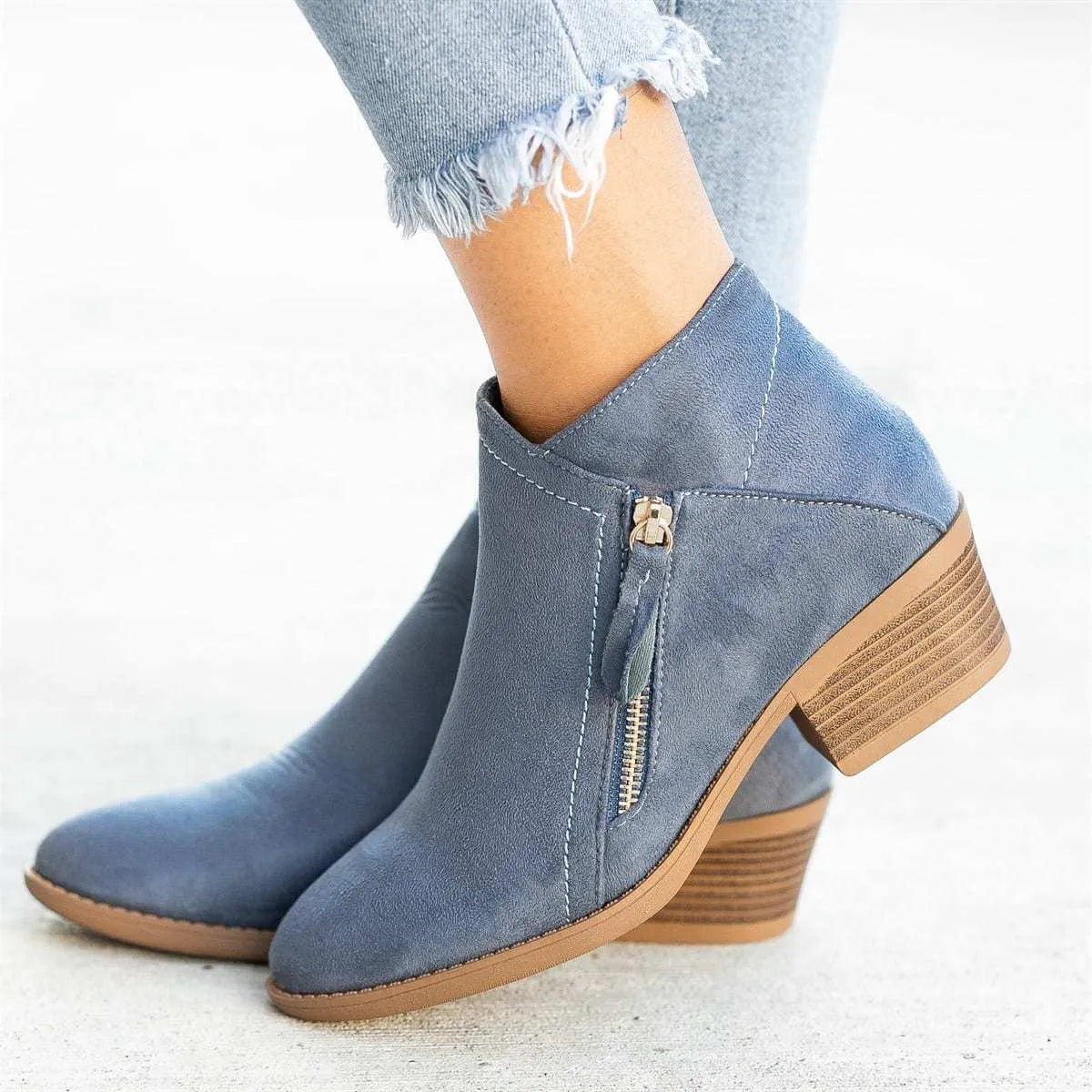 Women’s suede leather ankle boots with side zipper, thick heel, pointed toe, and non-slip sole in beige colour