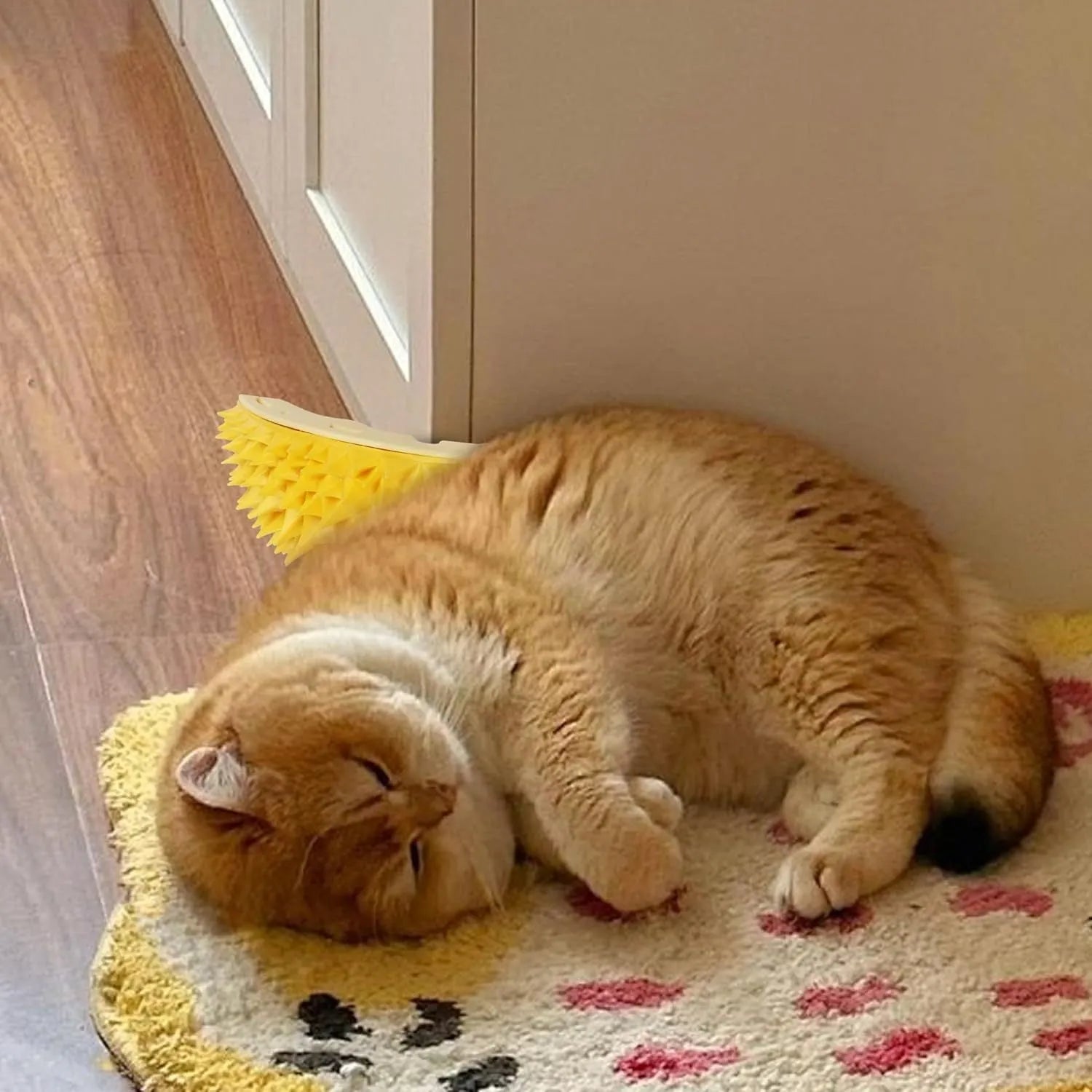 Yellow durian-shaped cat corner scratcher with massage comb for wall mounting