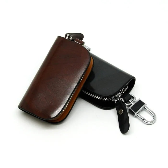 Genuine cowhide leather car key case with frosted finish showing black and brown colour options