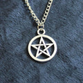 Vintage pentagram necklace with alloy pendant and adjustable chain in bronze colour on neutral background