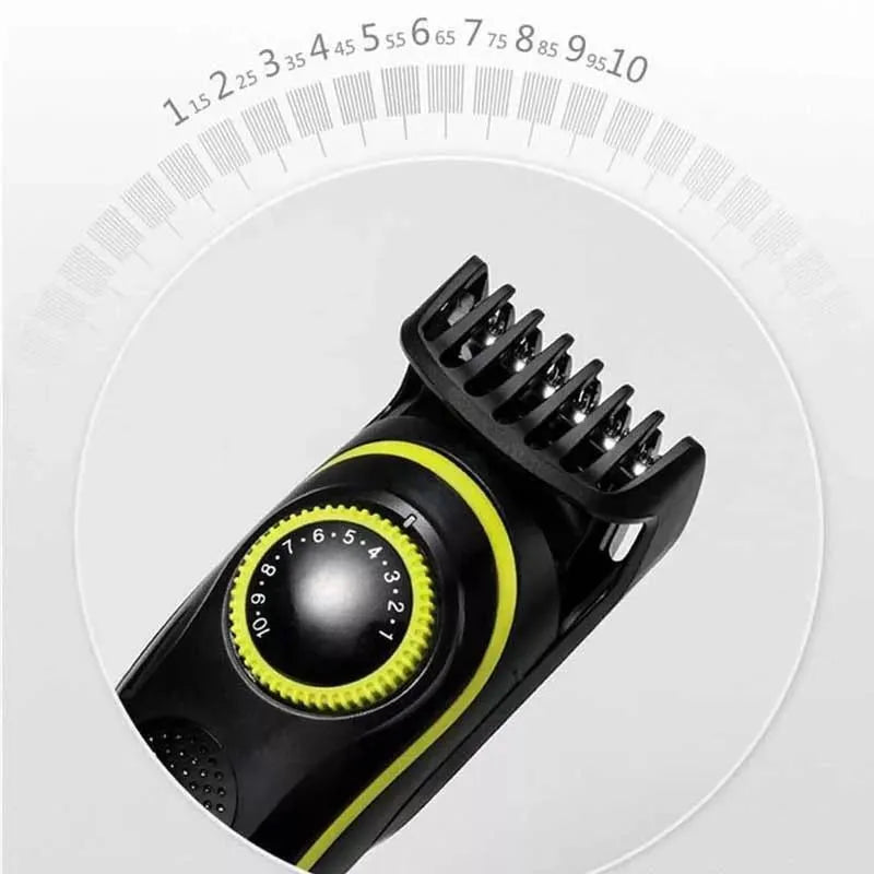 Black KM-696 household rechargeable electric hair clipper set with USB cable, grinding head, and cleaning brush.