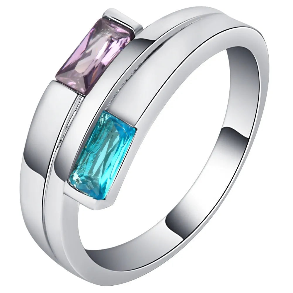 Silver electroplated copper ring with zircon stones, unisex European and American style fashion accessory.