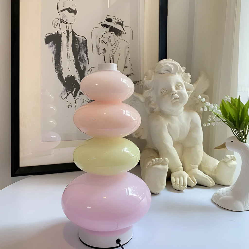 Candy String Rainbow Floor Lamp in creative macaron style with glass shade and iron body on a wooden table