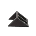 Black punk-style plastic pistol display stand on a flat surface.