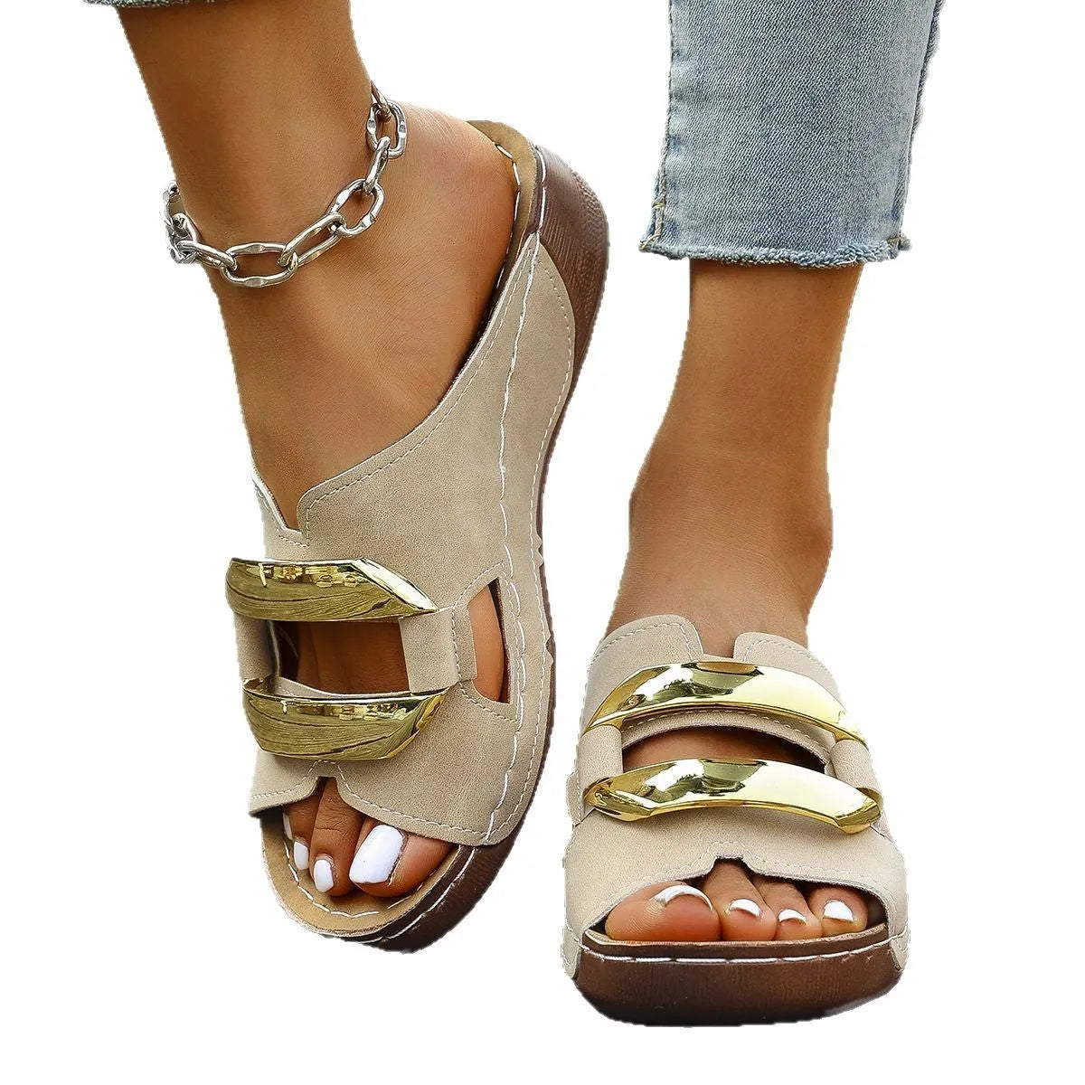 Roman style platform flip-flops in black with metal accents and rubber sole.
