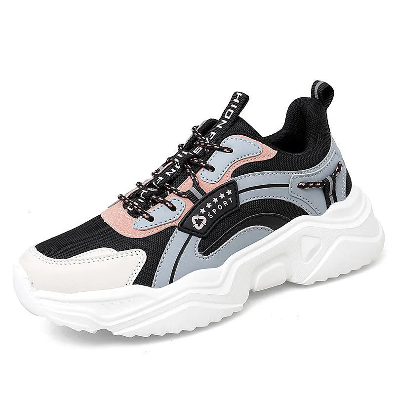 Women's white mesh casual trainers with a thick sole, round toe, and a buckle fastening detail.