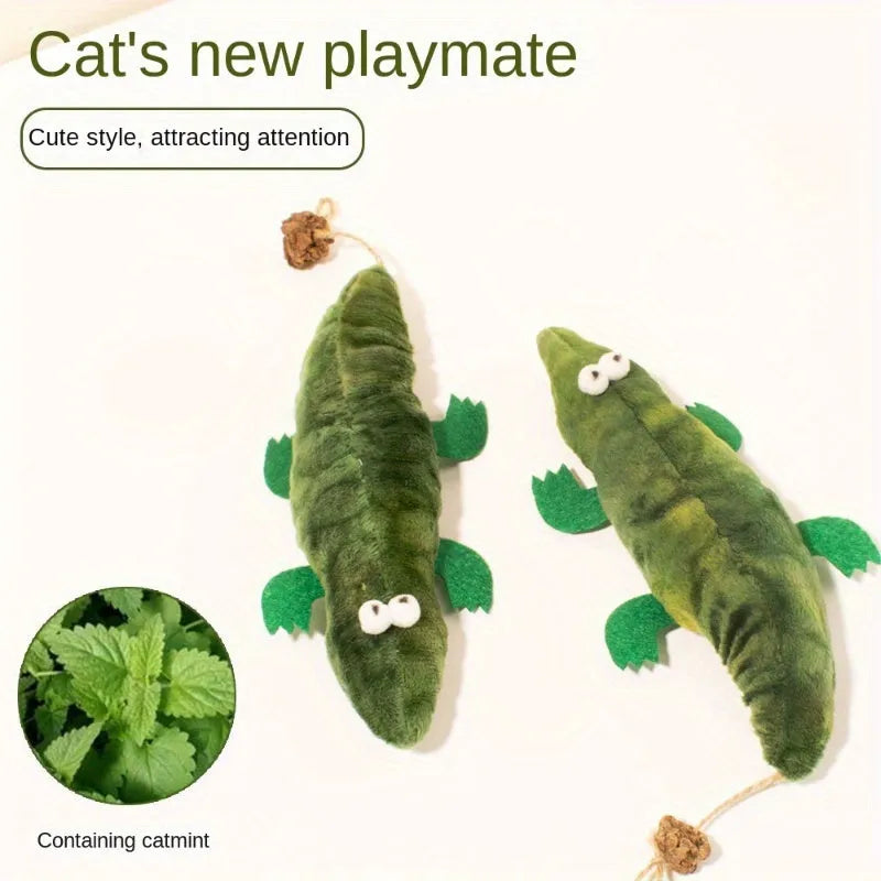 Green plush alligator cat toy with catnip and peppermint scent for oral cleansing and play.