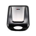 Black nut roasting machine measuring 31 by 26 by 11 centimetres