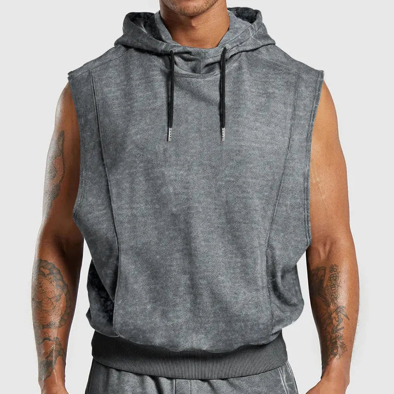 Men's distressed floral sleeveless hooded top in cotton blend, green colour, front view with hood and 3D patch pocket