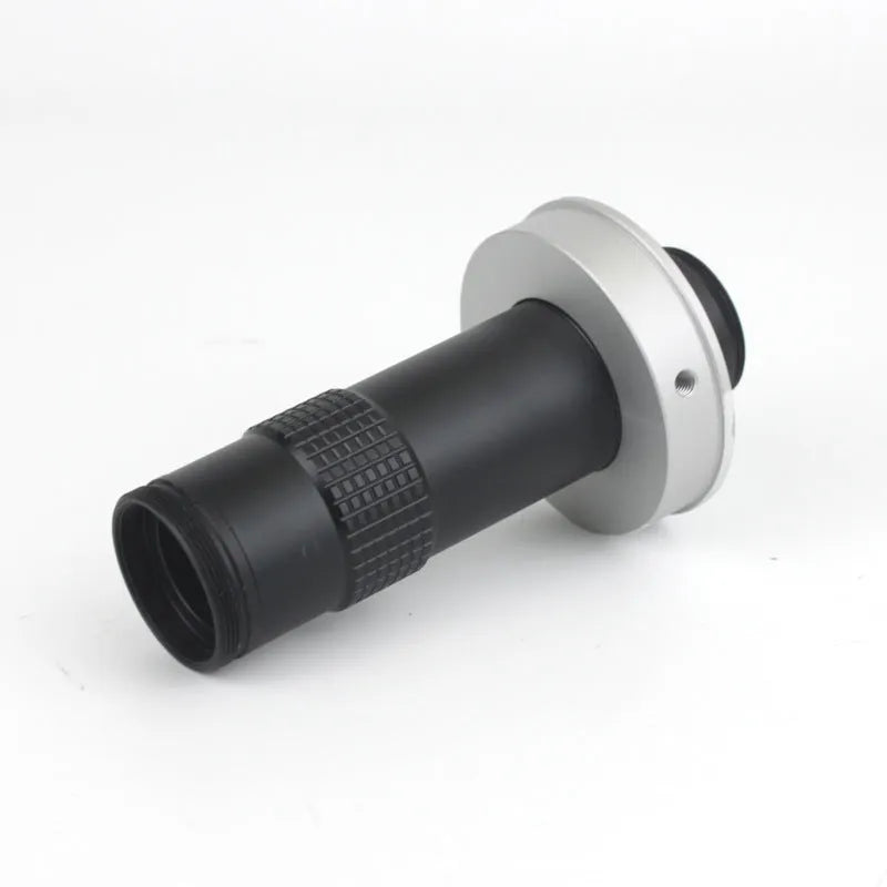 Black anodised aluminium industrial camera monocular lens for high-magnification inspection.