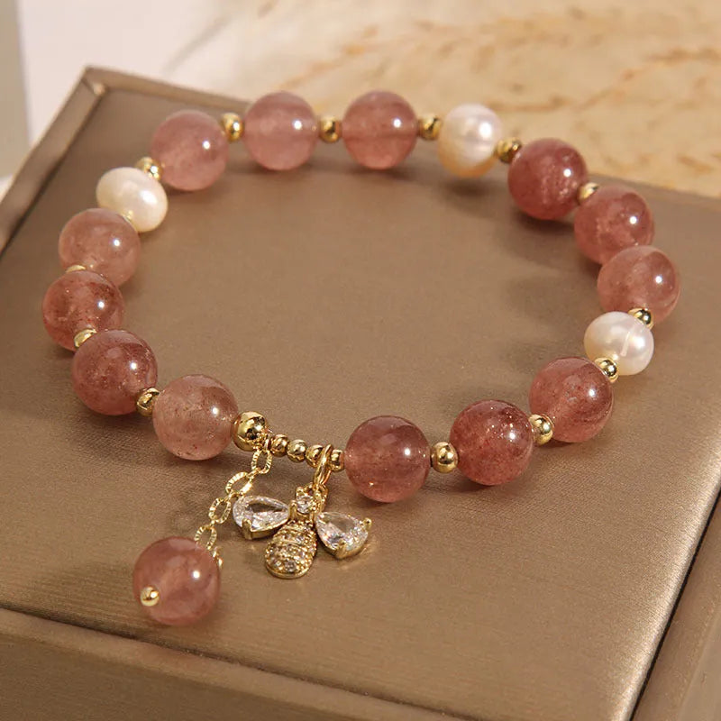 Women's pink strawberry quartz and freshwater pearl bracelet with zircon and alloy accents.