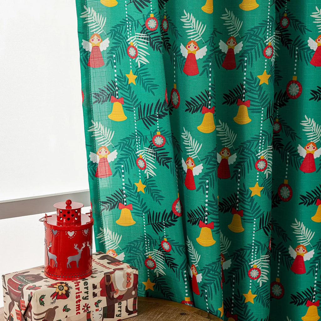 Red American-style cloth curtain with printed cartoon angels and snowmen, one metre wide.