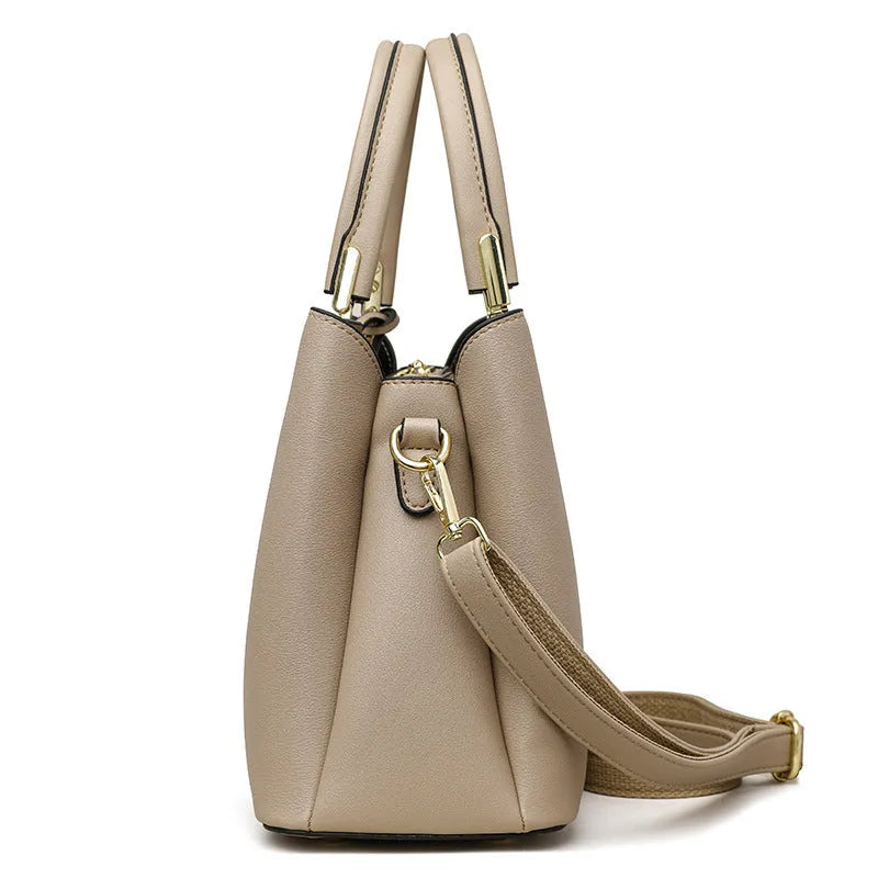 Women's black PU leather messenger bag with multi-layer shoulder design and sewing thread detailing