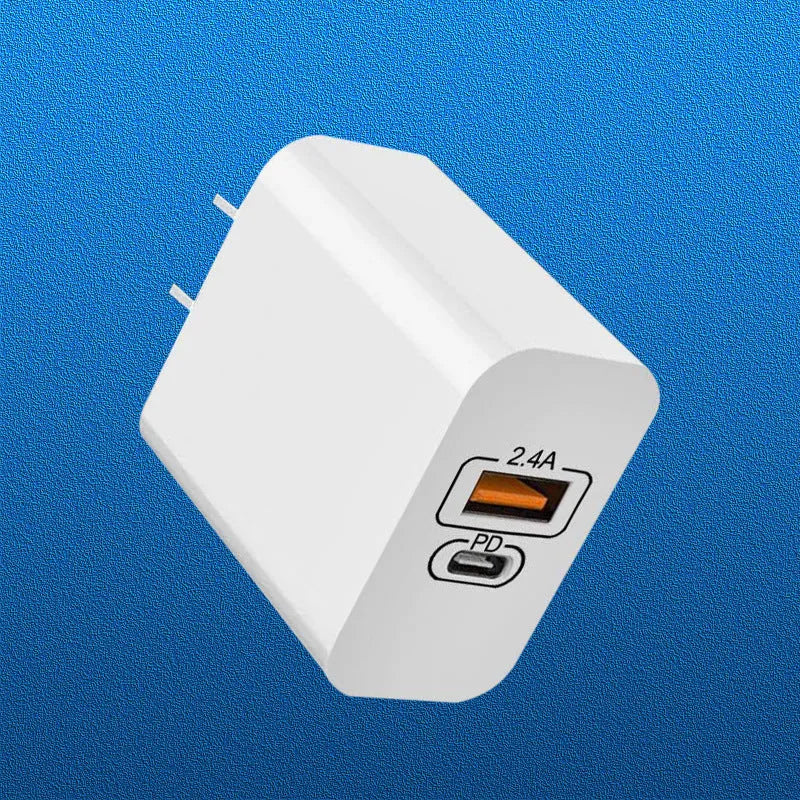USB travel charger with bare metal finish showing multiple plug options for international use