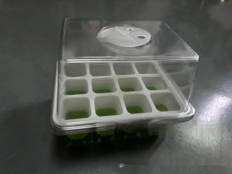 12-hole plastic nursery pot in green, floor-type design, 18.5x14.5x7.5 cm, for seed cultivation