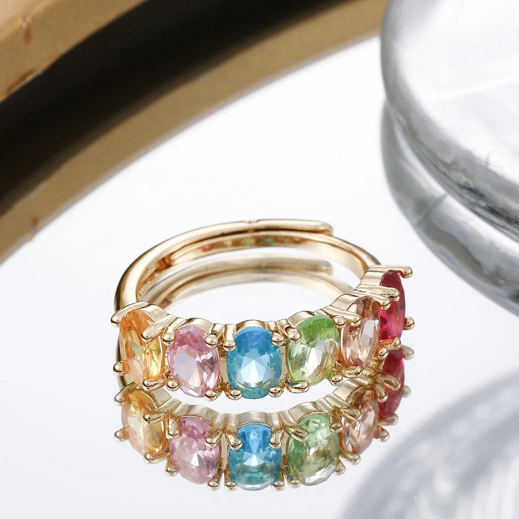 Gold electroplated copper ring with zircon stone and adjustable size in simple retro design