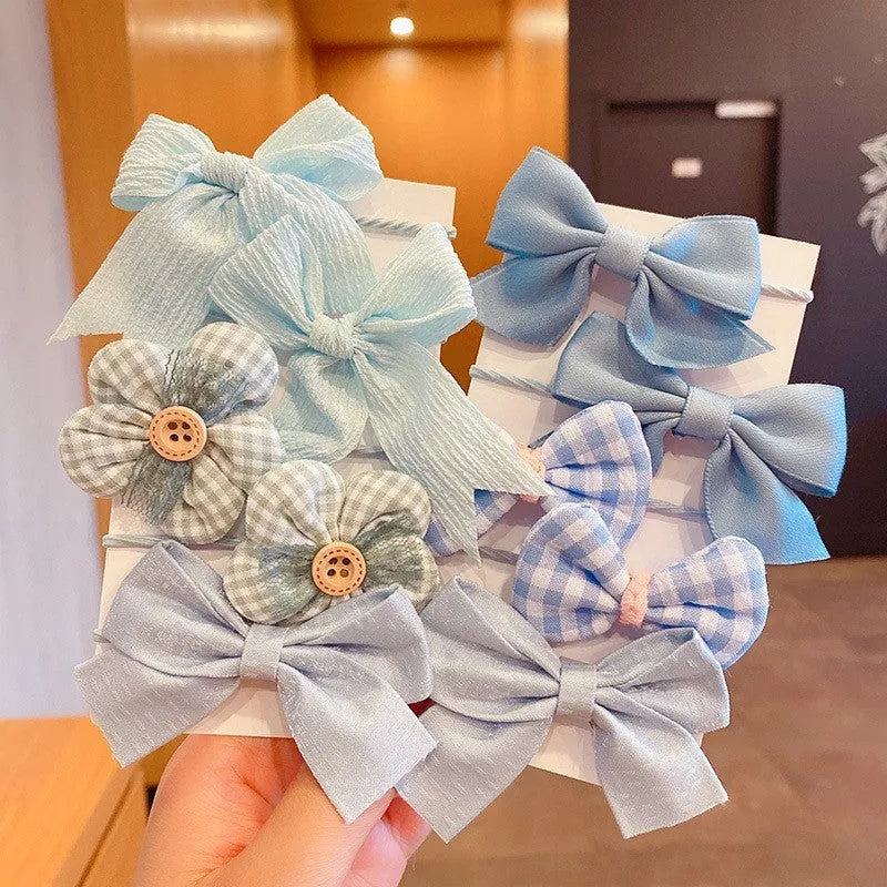 Fabric hair bow set for children with bow flower pattern in multiple colours