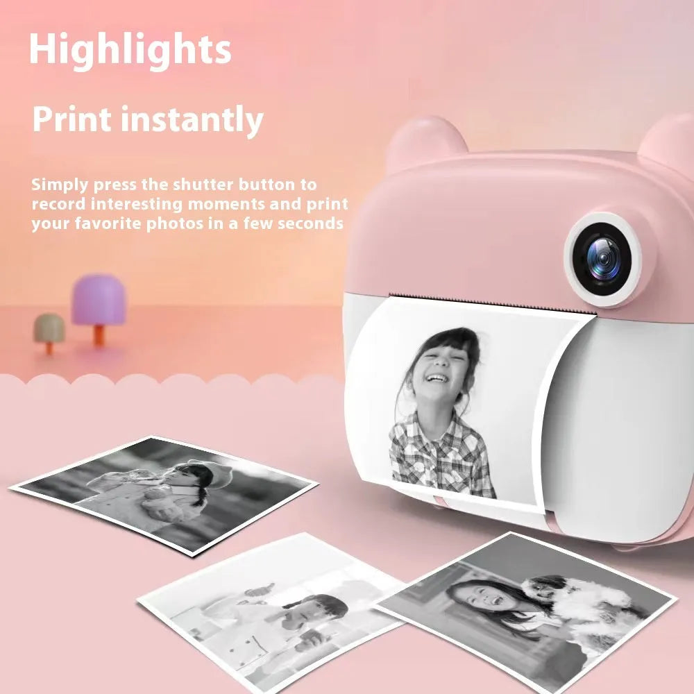 A pink children's SLR-style toy camera with a double lens on a white background.