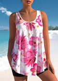 Pink printed plus size tankini swimsuit with high-waist briefs on a hanger.
