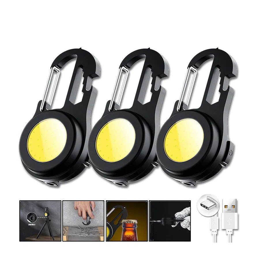 Black 6-in-1 multi-functional mini keychain lamp with COB light and magnetic base on metal surface