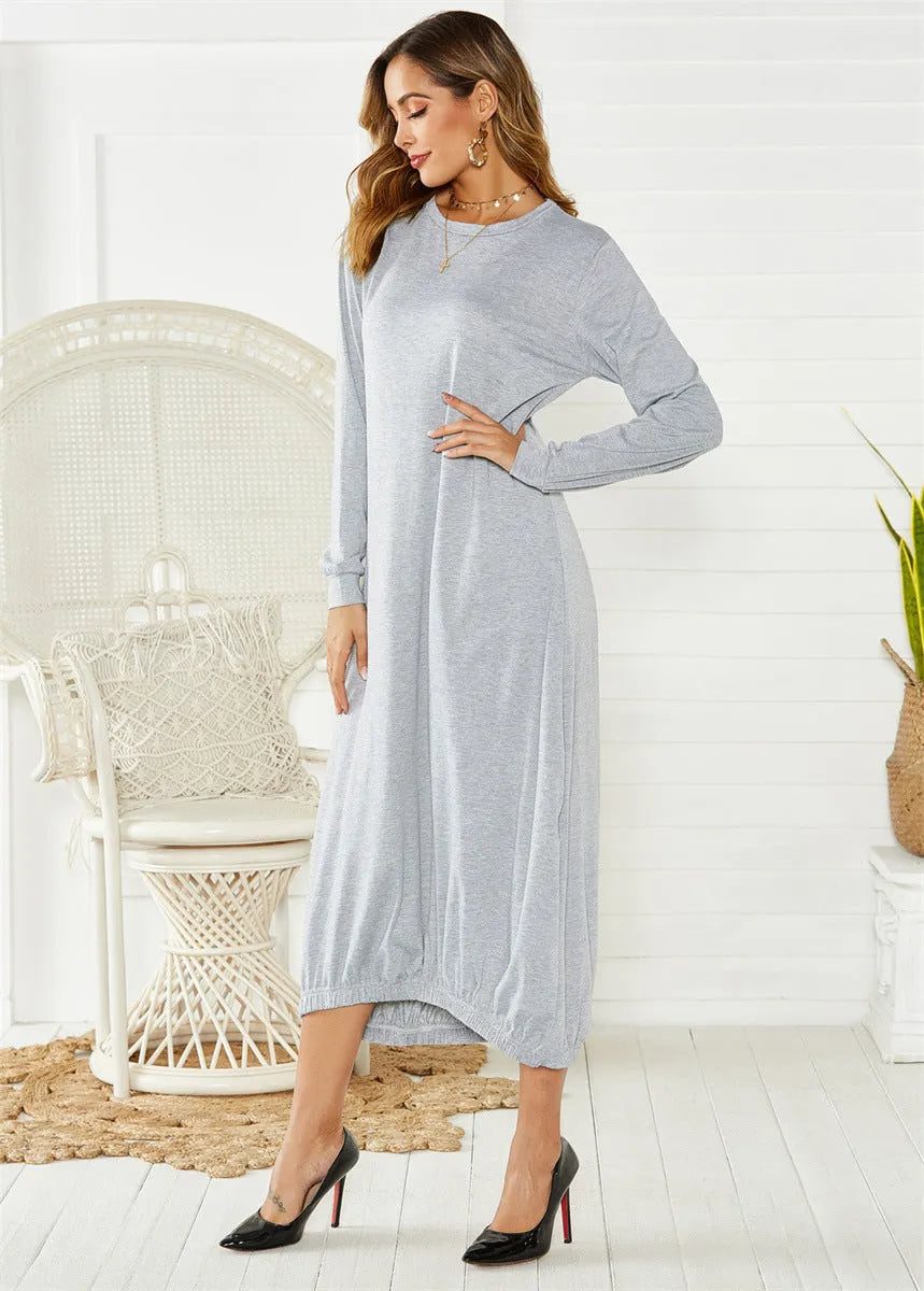 Black loose lace-up crew neck lantern dress on a hanger, casual polyester knit.