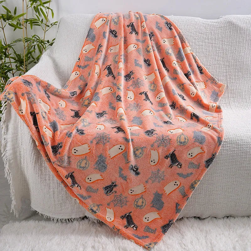 A soft flannel children's blanket with a cartoon pattern, shown in one of five available colours.