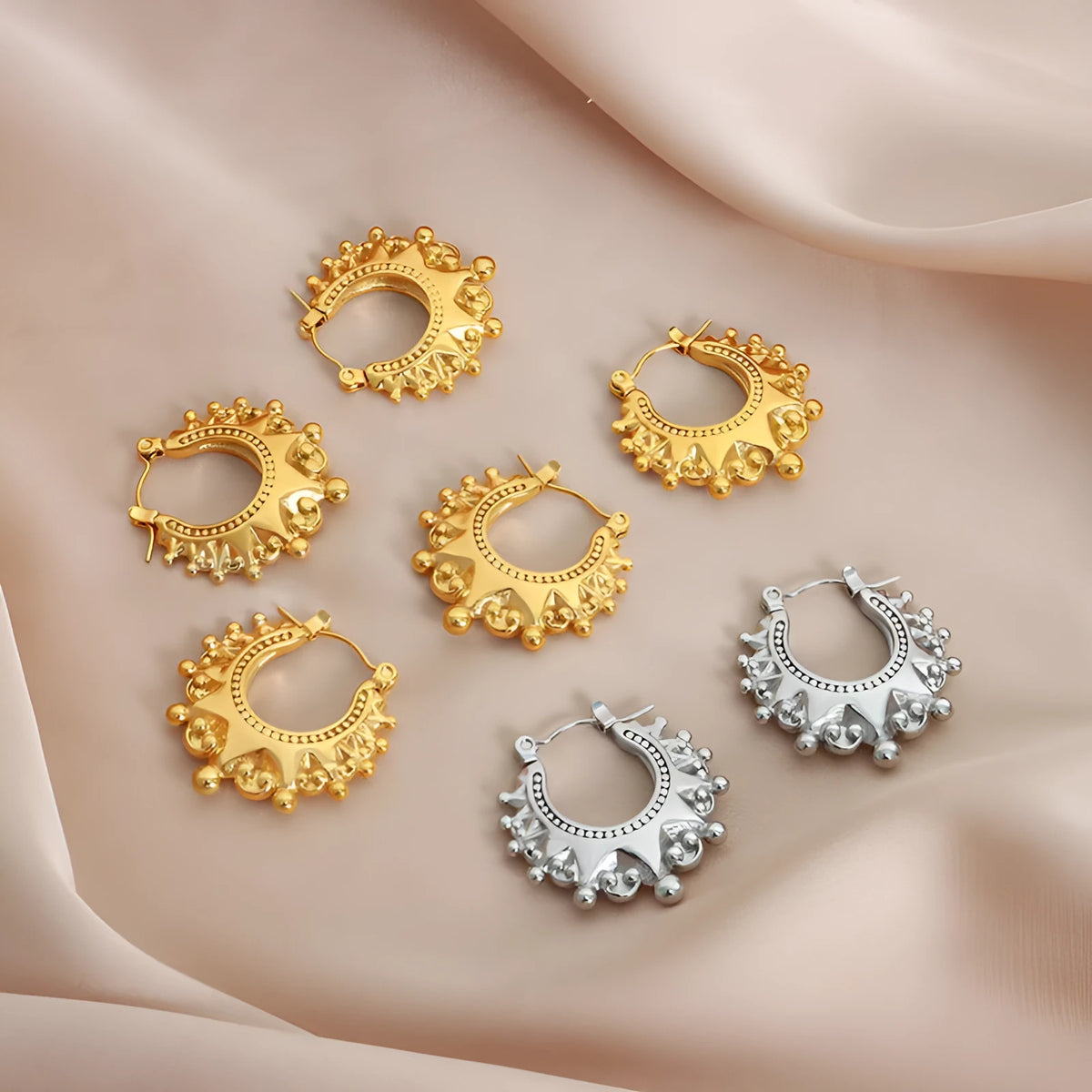 Titanium steel ball-shaped safety lock earrings in gold or steel with U-shaped electroplated finish