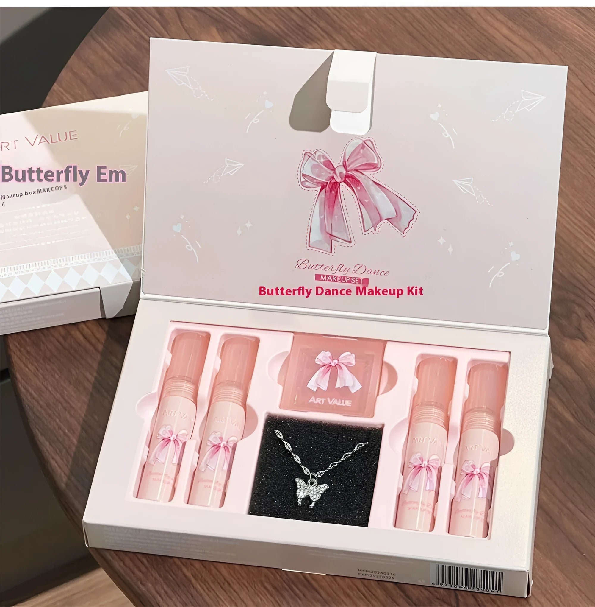 Pink butterfly box suite makeup set with lip muds, blusher, and necklace.