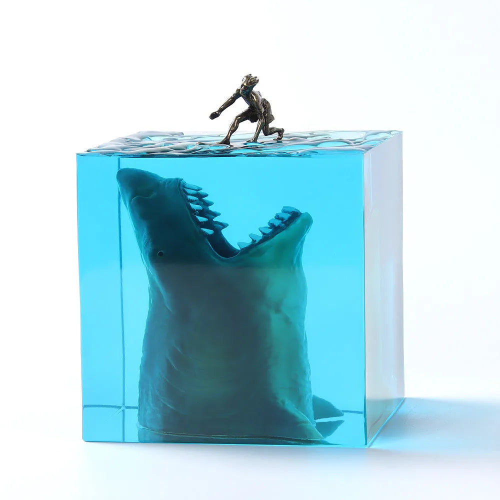 Clear epoxy resin ornament showing shark surfing on wave with integrated night light