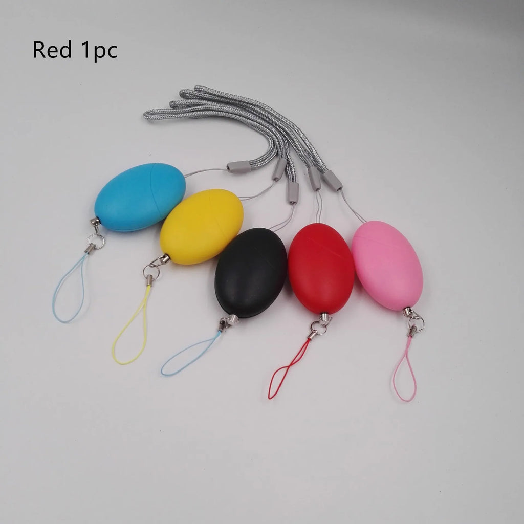 Oval personal alarm in black, blue, pink, red, or yellow with 120dB siren for women, elderly and children