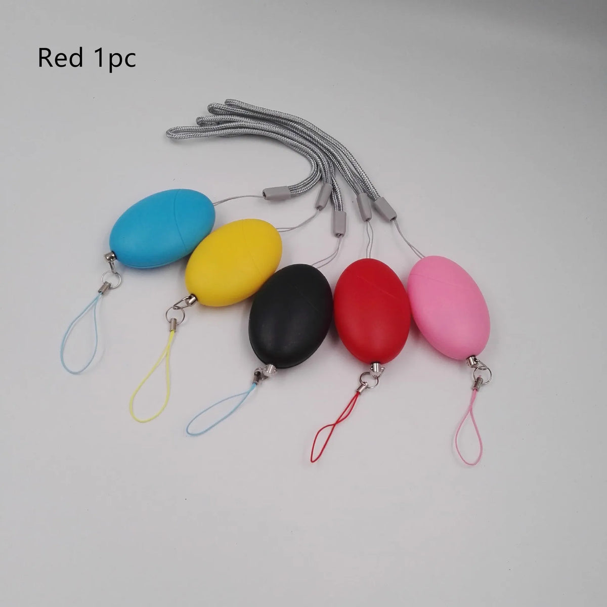 Oval personal alarm in black, blue, pink, red, or yellow with 120dB siren for women, elderly and children