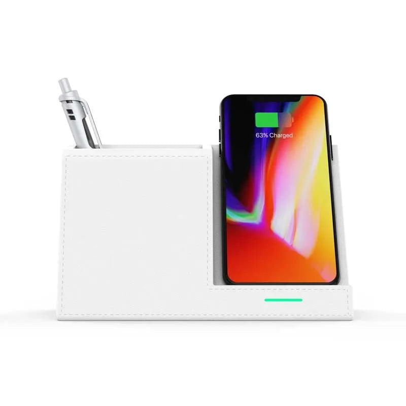 Black leather wireless charging station with phone on stand and pens in holder