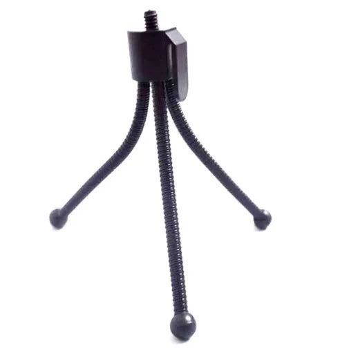 Small black iron mini tripod with ball head, shown extended and collapsed next to a mobile phone.