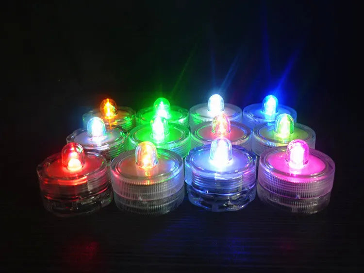 Set of 12 miniature LED waterproof candle lights in 7 colours with round and plum shapes