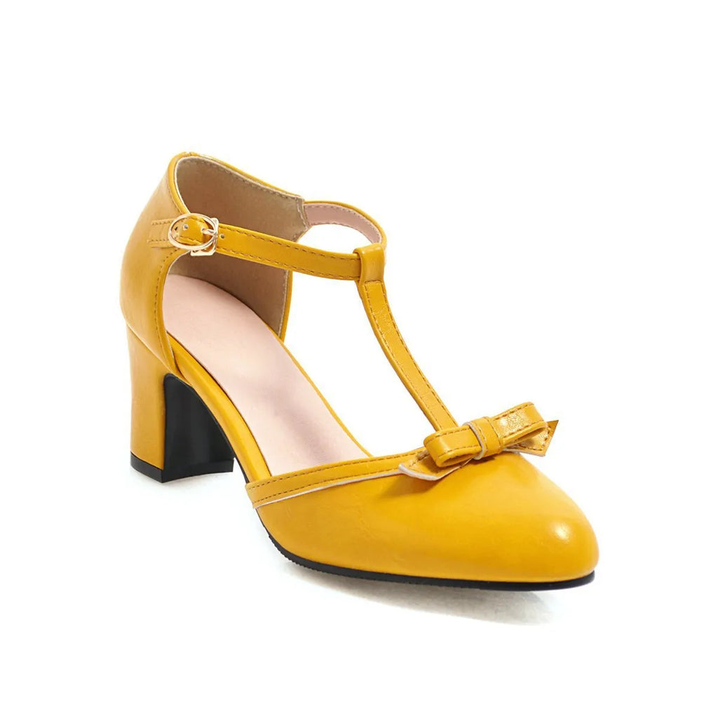 Women's apricot chunky heel sandals with hollow-out round toe, bow detail, and a buckle strap on a 6.5cm heel.