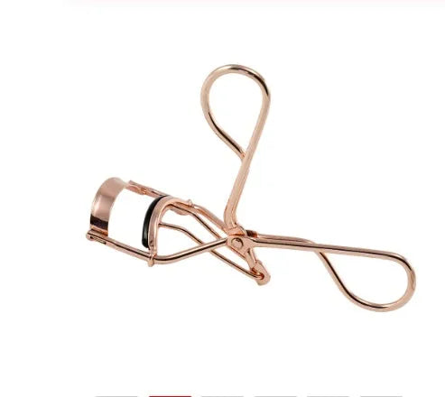 Rose gold plated local eyelash curler 10.3 x 3.6 cm with three rubber strips for lash curling