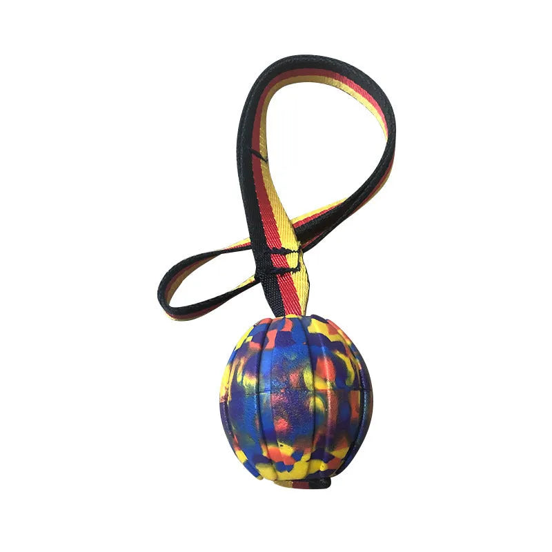 Yellow and camouflage coloured EVA floating knot balls for dogs in three different sizes on a blue background.