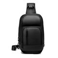 Black PVC medium-sized shoulder bag with air cushion strap and soft handle.