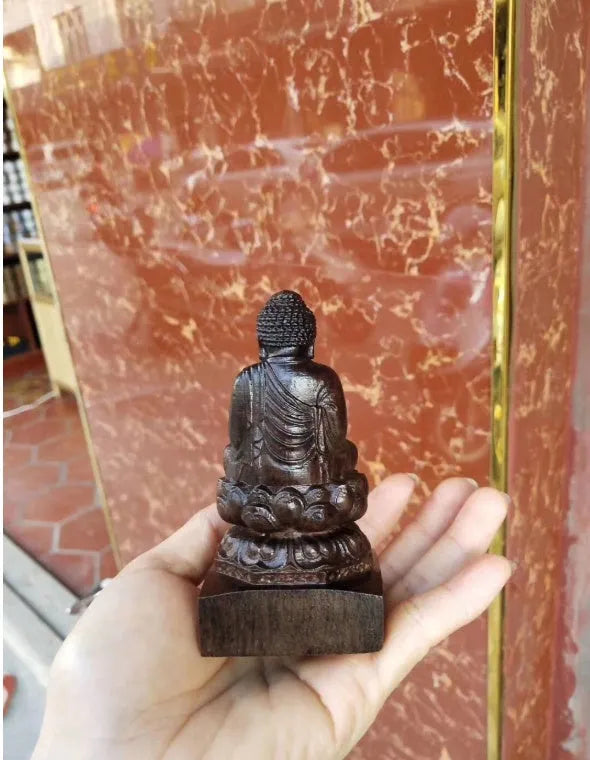 Natural black wood carving of Sakyamuni Buddha, 30cm tall, seated ornament for home or office